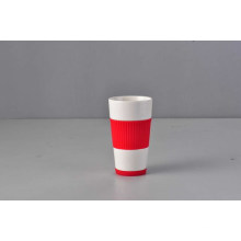 Tasse en porcelaine avec manchon et tapis en silicone